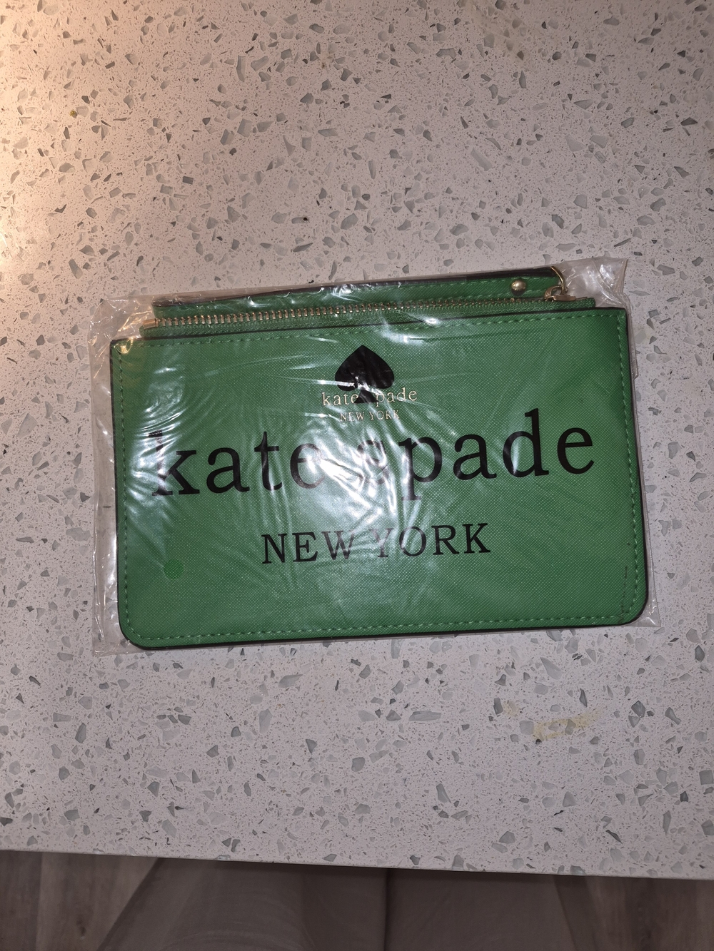 kate spade green logo wristlet pouch